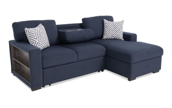 Playday Navy 93'' Transitional 2-piece right-arm chaise sectional in blue polyester fabric with built-in bookshelf, pop-up sleeper, Bluetooth audio, and accent pillows.