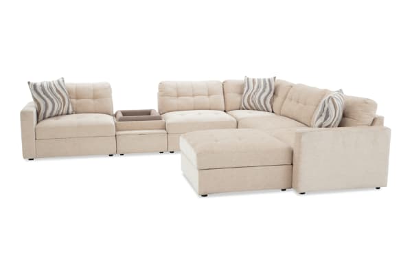 Beige Modular Bob® 7-piece contemporary fabric sectional with polyester upholstery, memory foam cushions, pet bed console, storage, and USB ports.
