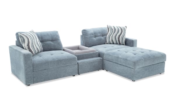 Light blue Modular Bob® Spa Blue 98'' 4-piece contemporary sectional with polyester fabric, pet bed console, storage seats, and USB charging ports.