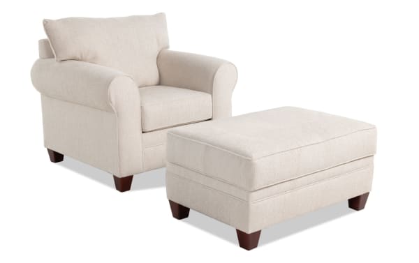 Transitional Portland Beige Chair and Storage Ottoman set in soft polyester fabric, featuring rolled arms, cushioned seat, accent pillow, and wooden legs.
