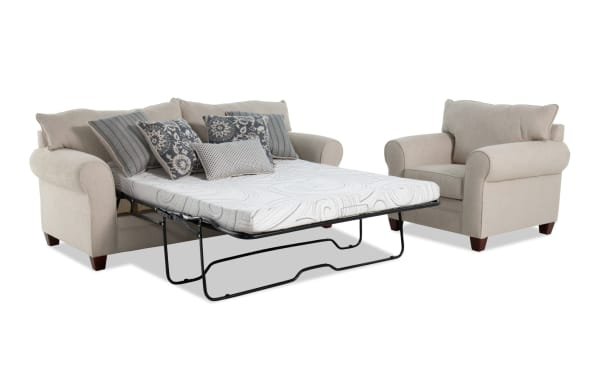 Portland Beige 85'' transitional sleeper sofa with queen cooling gel memory foam mattress, polyester fabric upholstery, matching beige chair, and decorative pillows.