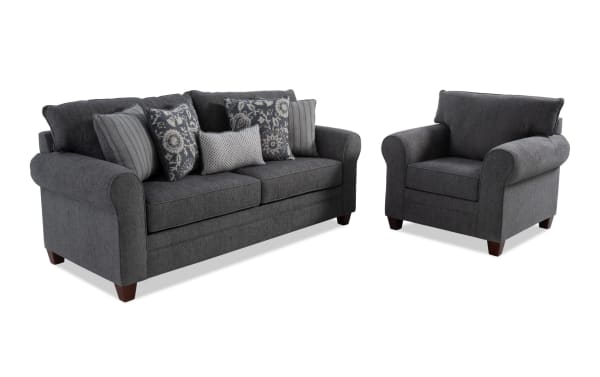 Portland Gray 85'' Sofa & Chair set in transitional style with soft gray polyester fabric upholstery, featuring rolled arms and decorative accent pillows.