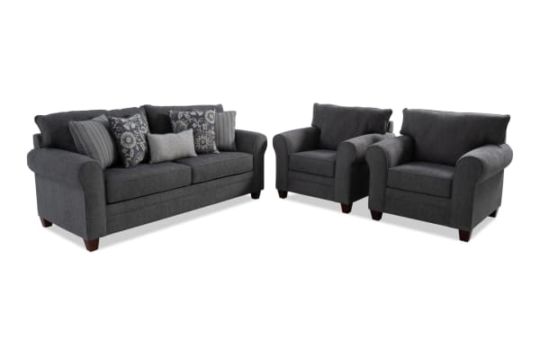 Portland Gray 85'' sofa and two chairs set in transitional style, upholstered in soft gray polyester fabric with rolled arms and included accent pillows.