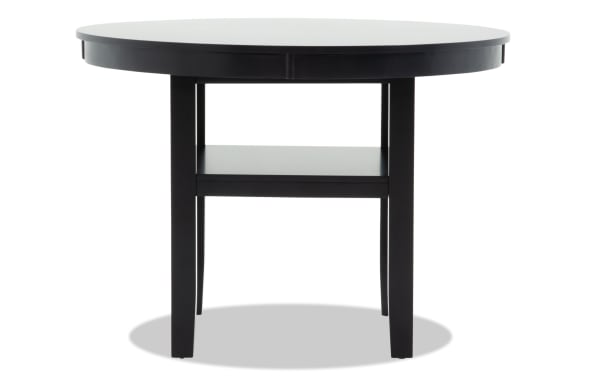 Contemporary London 5 Piece round dining table in black MDF with beige polyester fabric upholstery, sturdy silhouette with shelf, London Dining collection.