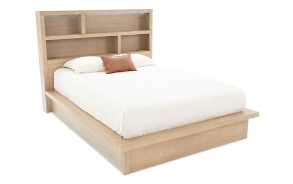 Studio Queen Light Oak Storage Platform Bed from Studio Bedroom collection, featuring contemporary MDF and oak veneer frame, built-in USB/USB-C ports, 3-way touch LED lighting, and a storage headboard in light oak finish.
