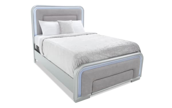 Shimmer Full Silver Storage Panel Bed with gray polyester fabric upholstery, glam silver MDF frame, LED lighting, and footboard storage drawer.