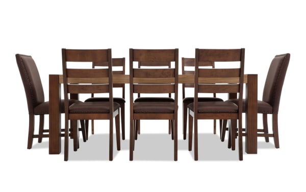 Canyon 9 Piece Brown Faux Leather Upholstered Dining Set with rustic multi-tone MDF wood table and memory foam brown chairs from Canyon Dining collection.