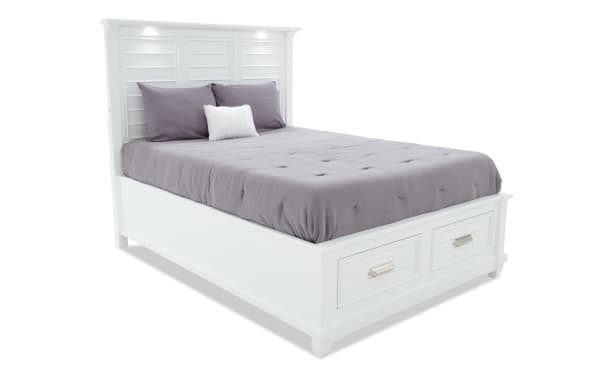 Sunset Cove Queen White 2 Drawer Storage Bed in coastal style with MDF frame, slatted headboard, LED lighting, and footboard drawers for storage.