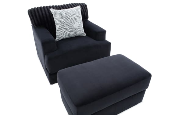 Contemporary Sofia Black Chair & Ottoman set in soft black polyester fabric with channel tufted back and plush memory foam cushioning.