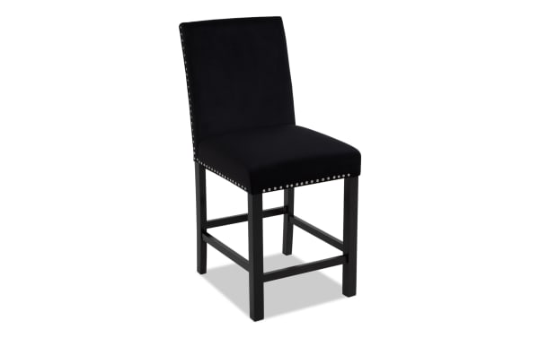Black upholstered bar stool with a padded seat and backrest, silver nailhead trim, and dark wooden legs with footrests, modern design.