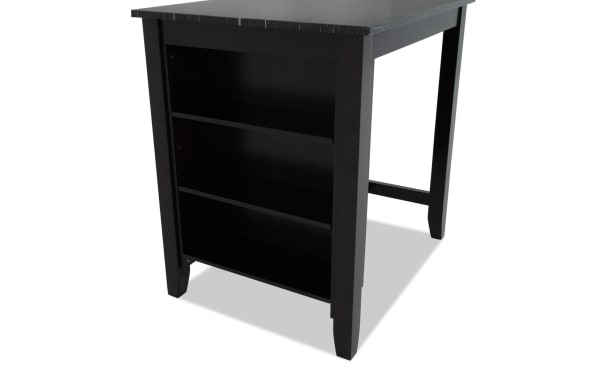 Black wooden desk with built-in open shelving on one side, featuring two shelves and tapered legs, suitable for office or home use.