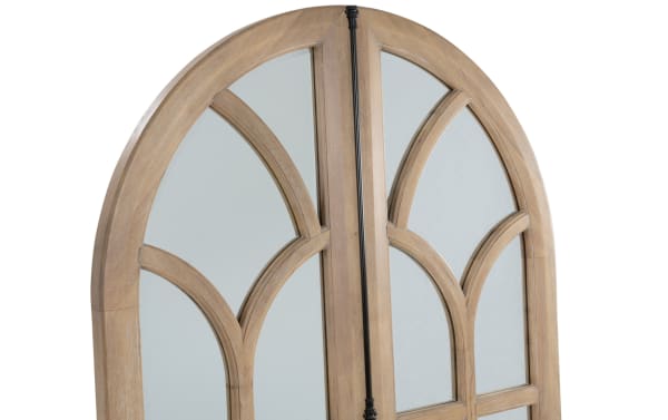 Arched wooden-framed mirror with decorative muntins, featuring a natural light wood finish and clear reflective glass.