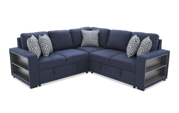 Navy blue fabric sectional sofa with L-shape design, featuring built-in wooden side shelves and patterned accent pillows for modern living rooms.