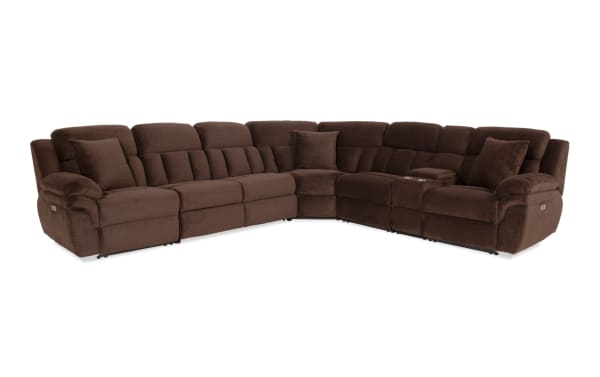 Brown fabric sectional recliner sofa with plush cushions, cup holders, and corner wedge, designed for living room comfort and style.
