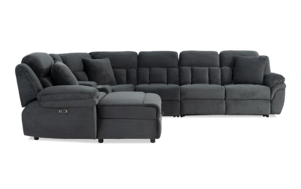 Dark gray fabric sectional sofa with plush cushions, reclining seats, and a chaise lounge, designed for modern living rooms.