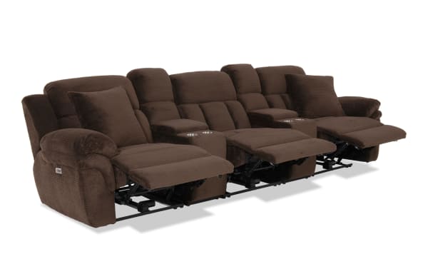 Brown fabric reclining sectional sofa with three seats, plush cushions, cup holders, and padded armrests, designed for comfort and relaxation.