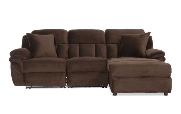 Brown fabric sectional sofa with plush cushions, padded armrests, and two matching throw pillows, designed for living room comfort and style.