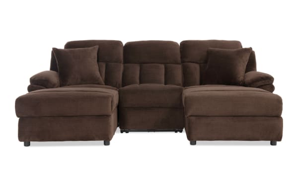 Brown sectional sofa with plush cushions and two matching throw pillows, featuring soft textured fabric and a modern design for living room comfort.