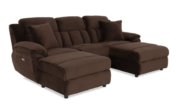 Brown sectional sofa with plush fabric upholstery, cushioned armrests, and two matching throw pillows, designed for comfort and style.