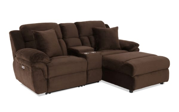 Brown fabric sectional sofa with plush cushions, reclining seats, and built-in cup holders, designed for living room comfort and style.