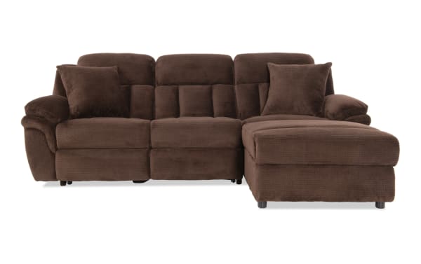 Brown sectional sofa with plush cushions and soft textured fabric, featuring a chaise lounge on the right side for comfortable seating.
