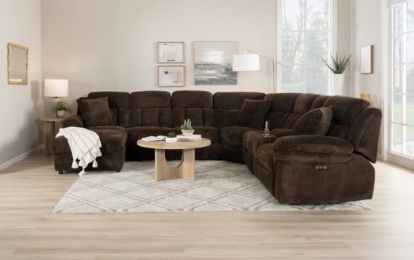 Playmaker Chocolate 133'' transitional 3-piece fabric sectional in brown polyester with power recliners, dual chaise, USB/USB-C ports, sleeper, and accent pillows.