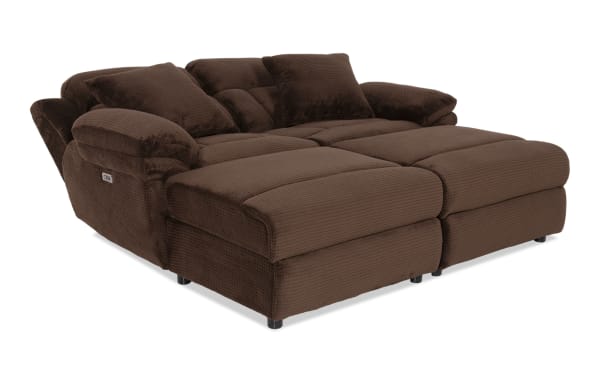 Playmaker Chocolate 79'' power reclining dual chaise sofa in brown polyester fabric with USB/USB-C ports, accent pillows, and hidden storage.