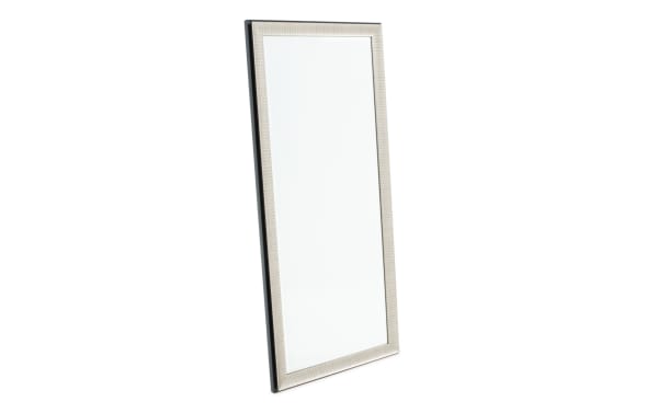 Full-length rectangular mirror with a beige textured frame and a black backing, suitable for home or office decor.