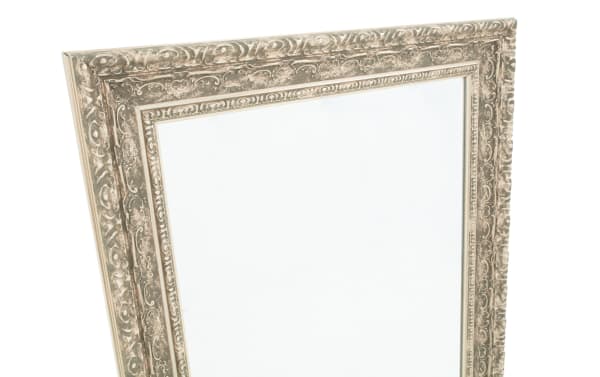 Ornate vintage-style rectangular mirror with an intricately carved beige and brown decorative frame, suitable for home decor.