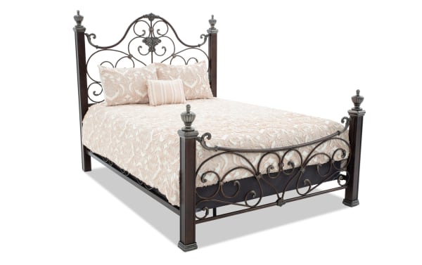 Regency 5 Piece Queen bed with cherry wood posts, brown hand-painted metal scrollwork, and beige patterned bedding from Regency Bedroom collection.