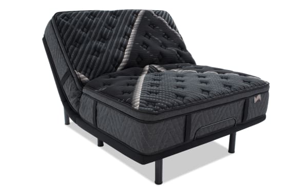 Power Bob Ultra Base with Lush 13.5" Queen Ultra Plush Mattress in dark gray, featuring a quilted pillow top, layered foam, and adjustable base with black metal legs.