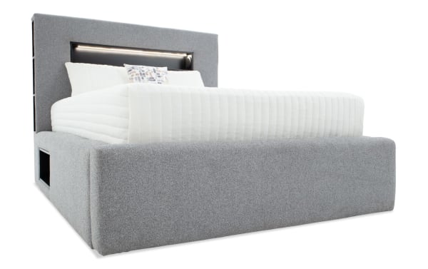 Playday Queen Gray Upholstered Storage Platform Bed in contemporary style with gray polyester fabric, built-in bookshelf, LED lighting, and Bluetooth speakers.