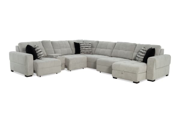 Slider Bob Gray 150'' Power Sliding 7 Piece Chaise Sectional in gray polyester fabric with USB/USB-C ports, memory foam cushions, cup holders, storage, and six accent pillows.