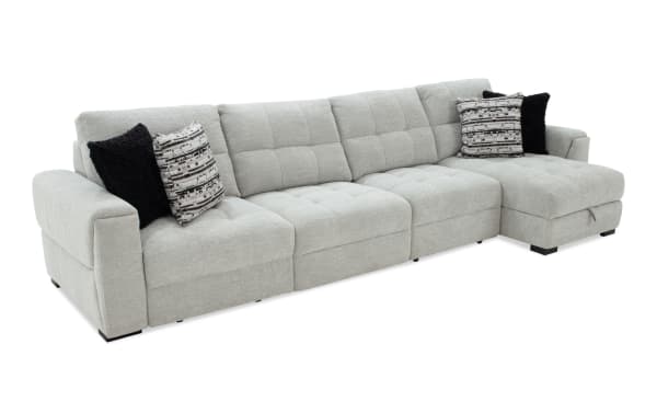 Slider Bob Gray 149'' power sliding 4-piece right arm facing chaise sectional in gray polyester fabric. Transitional style with tufted cushions, USB & USB-C ports, cupholders, storage, and accent pillows for comfort and convenience.