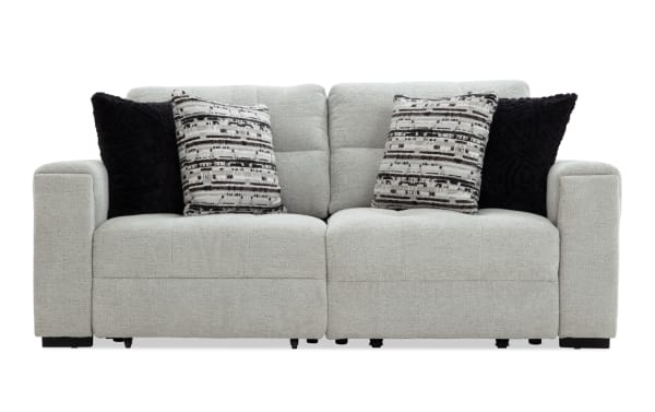 Gray Slider Bob 83'' power sliding loveseat in transitional style with plush polyester fabric, memory foam cushions, and accent pillows.