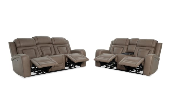 Brown leather reclining sofa set with three seats on left and two seats with center console on right, featuring padded cushions and armrests.