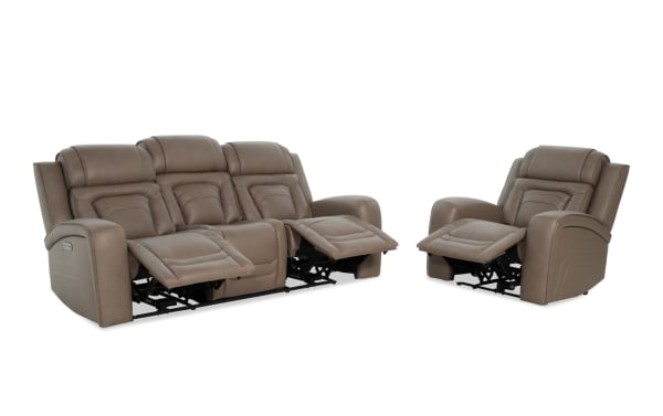 Brown leather reclining sofa set with a three-seat sofa and single armchair, featuring padded cushions and extended footrests for comfort.