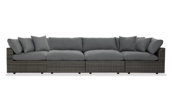 Dream 4 Piece Gray Wicker Outdoor Sectional with modular design, gray all-weather wicker, aluminum frame, and reversible polyester cushions.