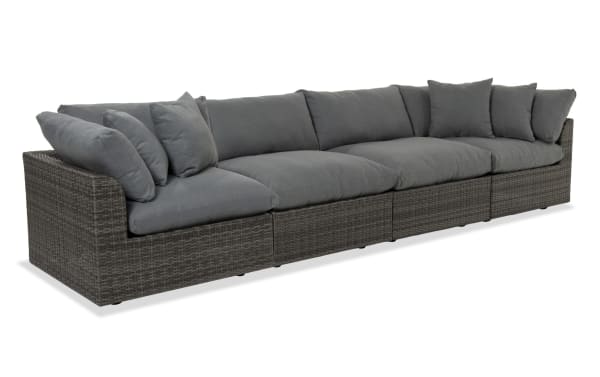 Dream 4 Piece Gray Wicker Outdoor Sectional with oversized reversible cushions, modular design, all-weather wicker, and powder-coated aluminum frame in transitional style.