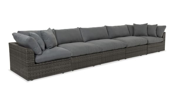 Dream 5 Piece Gray Wicker Outdoor Sectional with modular design, oversized reversible cushions, all-weather wicker, aluminum frame, and gray polyester fabric.