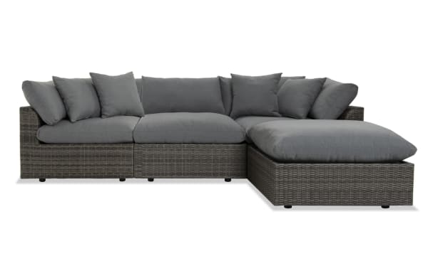 Dream 4 Piece Gray Wicker Outdoor Sectional with modular design, gray all-weather wicker, aluminum frame, and reversible polyester cushions.