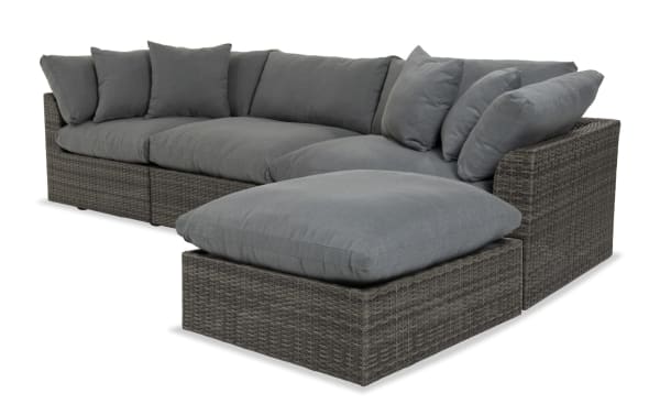 Gray Dream 4 Piece Outdoor Sectional with all-weather wicker, aluminum frame, reversible fade-resistant polyester cushions, and modular design.