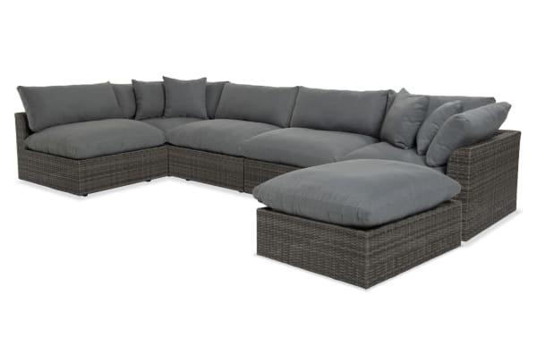 Dream 6 Piece Gray Wicker Outdoor Sectional with oversized reversible cushions, all-weather wicker, aluminum frame, and modular design for customizable comfort.