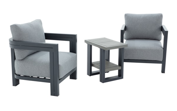 Modern outdoor patio set with two gray cushioned armchairs and a matching gray side table, featuring sturdy dark metal frames and soft fabric upholstery.