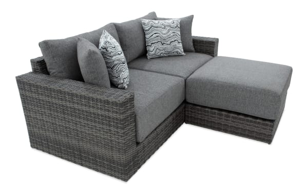 Modular Bob® 3 Piece Gray Wicker Loveseat with Ottoman in transitional style, featuring gray all-weather wicker, rust-proof aluminum frame, and plush polyester cushions with memory foam.