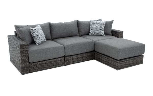 Modular Bob® 4 Piece Gray Wicker Outdoor Conversation Set with Ottoman, transitional style, all-weather wicker, rust-proof aluminum frame, gray polyester cushions with memory foam, versatile sectional for outdoor spaces.