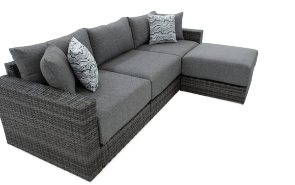 Modular Bob® 4 Piece Gray Wicker Outdoor Conversation Set with Ottoman in transitional style, featuring gray all-weather wicker, rust-proof aluminum frame, and plush polyester cushions with memory foam.