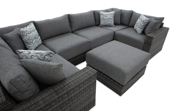 Modular Bob® 7 Piece Gray Wicker Outdoor Conversation Set with Ottoman, transitional style, gray all-weather wicker and rust-proof aluminum frame, plush polyester cushions with memory foam, versatile sectional for outdoor seating.