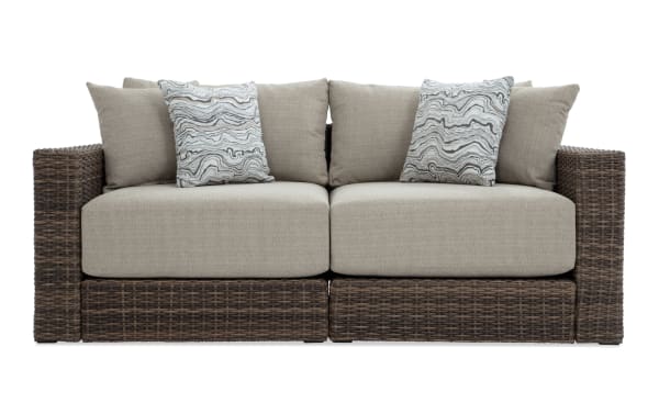 Modular Bob® 2 Piece Beige & Brown Wicker Outdoor Loveseat in transitional style, featuring all-weather wicker, rust-proof aluminum frame, and beige polyester cushions with memory foam.