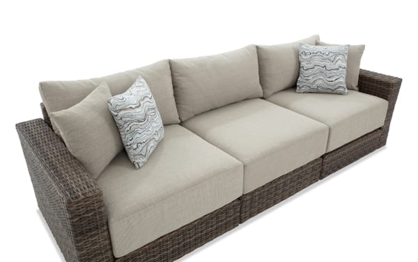 Modular Bob® 3 Piece Beige & Brown Wicker Outdoor Conversation Set with rust-proof aluminum frame, all-weather wicker, and plush beige polyester cushions in transitional style.